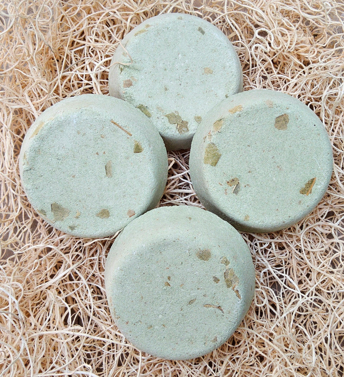 InspireByMK Eucalyptus Menthol shower steamer combining eucalyptus essential oil and menthol with eucalyptus hydrosol, light sage-green handcrafted steamer with dried eucalyptus for sinus relief and cooling aromatherapy