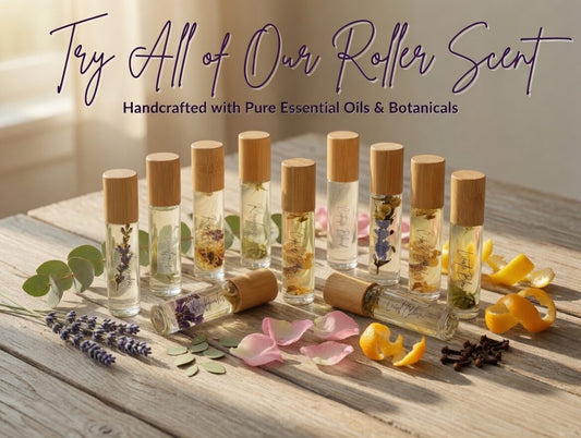 Try all of our roller scents - full collection of natural essential oil roller bottles displayed with fresh botanicals and citrus. Handcrafted aromatherapy perfume rollers made with pure essential oils and dried flowers.