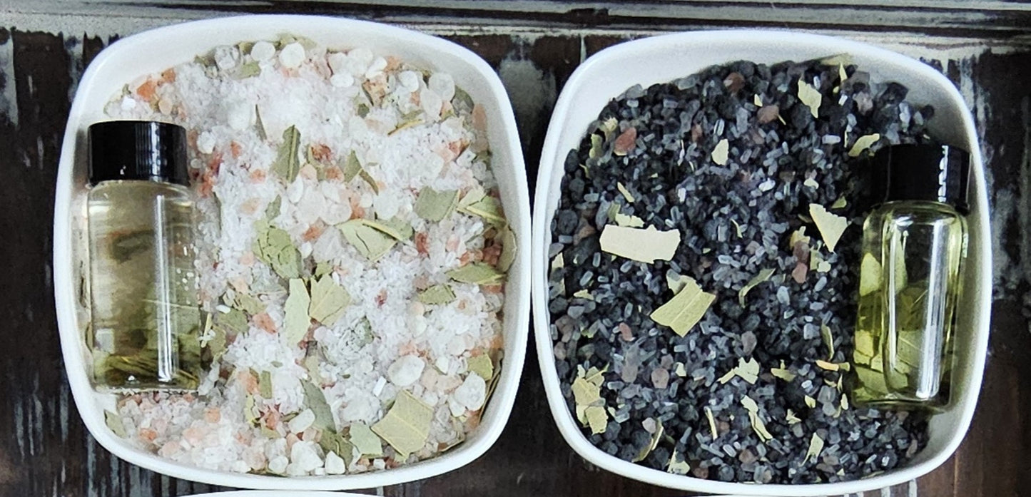 InspireByMK Eucalyptus bath salts comparison showing light epsom blend and dark lava blend in white ceramic bowls with dried eucalyptus leaves and complementary eucalyptus essential oil bottles for natural aromatherapy spa bath soaks
